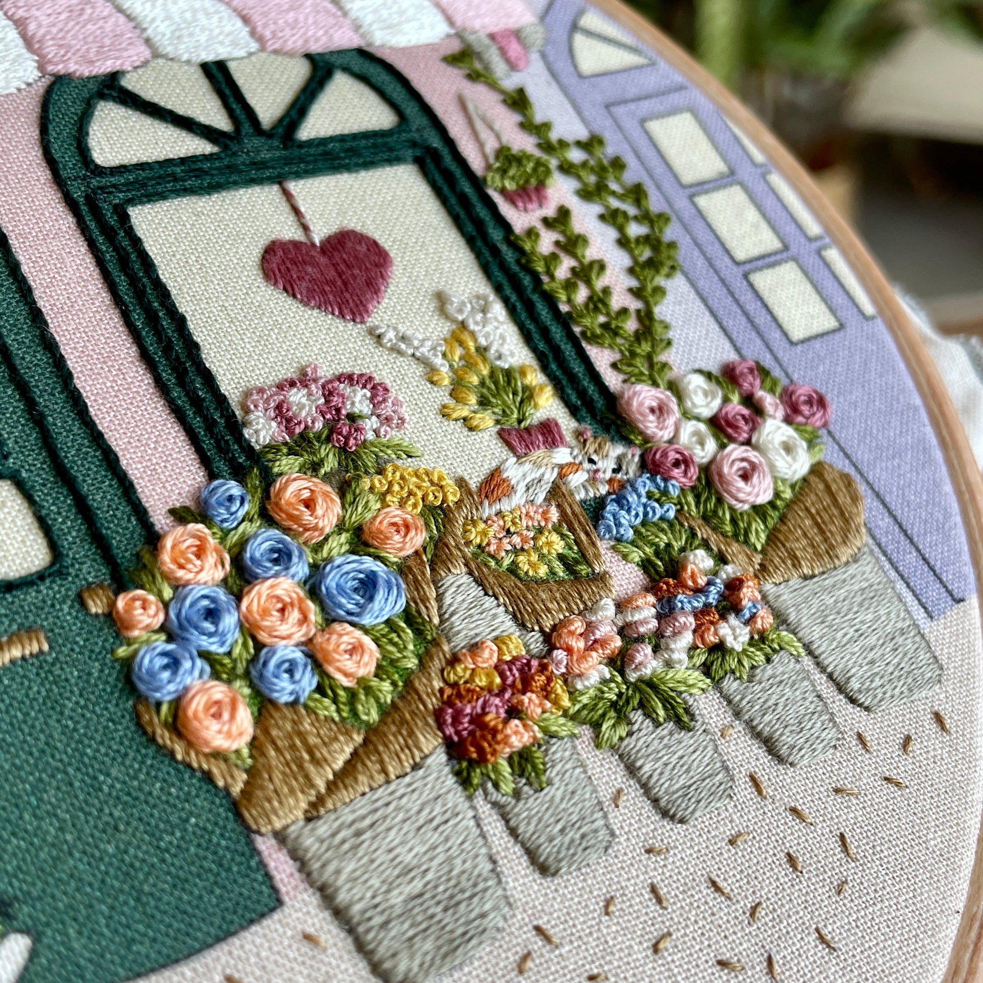 Embroidery hoop with floral and heart design